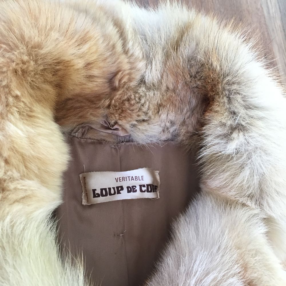 Manteau fourrure loup prix hot sale