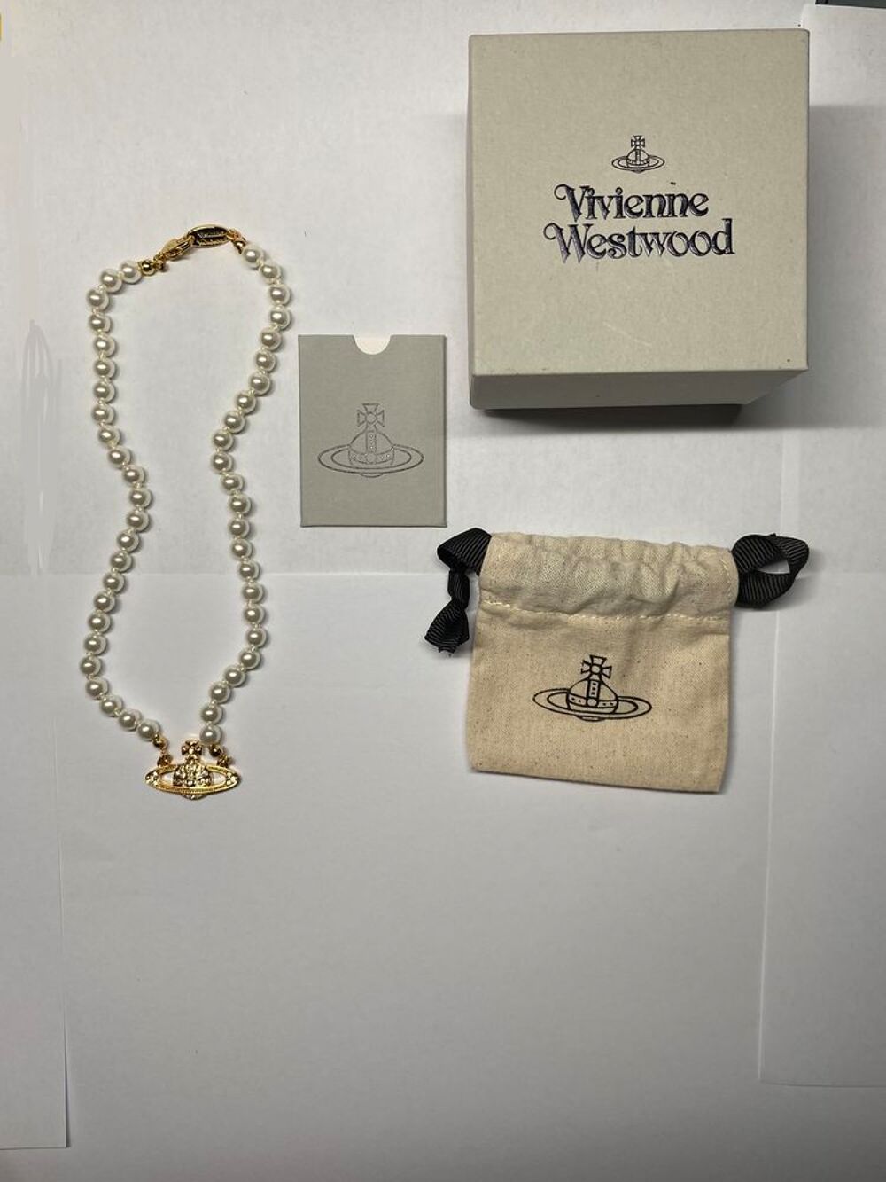 Collier dor&eacute;e &agrave; perle Vivienne Westwood Bijoux et montres