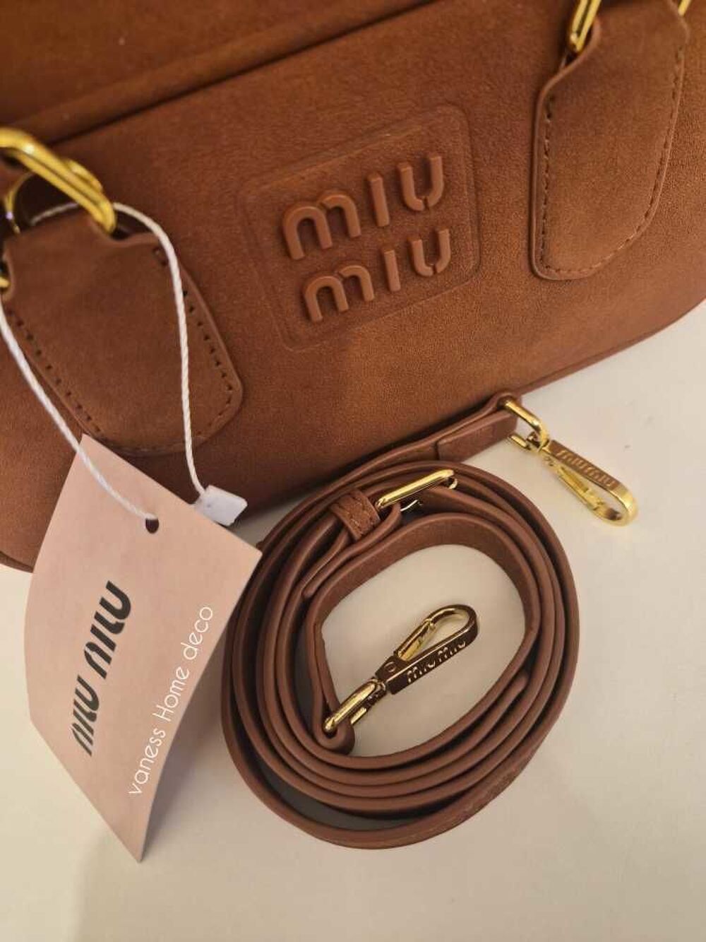 dupe de luxe miu miu neuf boite et pochette cuir de veau et daim 160e Maroquinerie