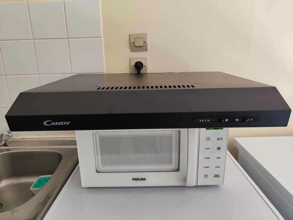 Hotte aspirante Candy noir neuve garantie Cuisine