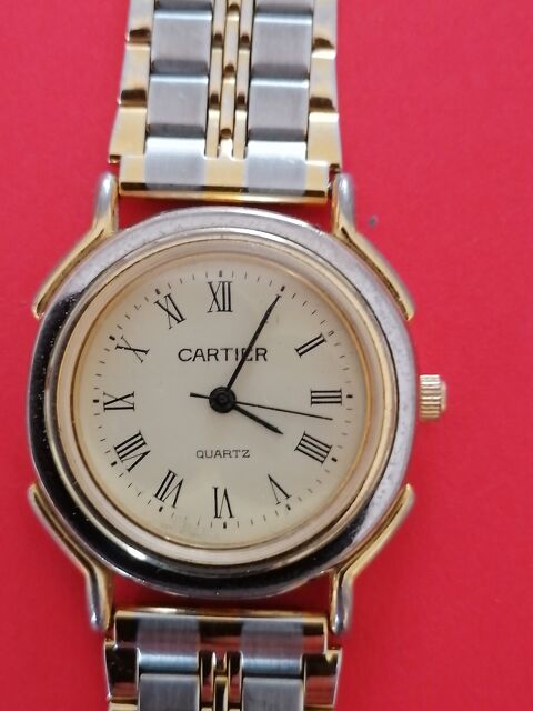Montre quartz Cartier acier et doré tres bon état général Angres (62)