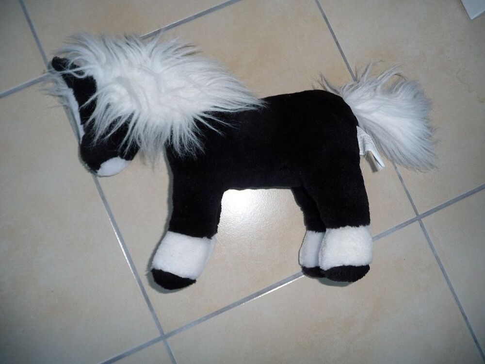 Cheval en peluche noir et blanc Jeux / jouets
