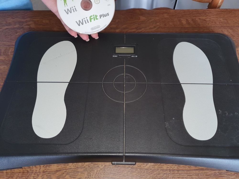 Wii fit plus Consoles et jeux vidéos