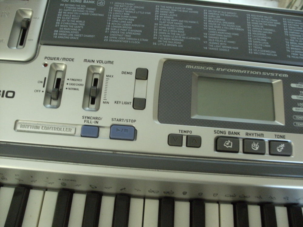 clavier CASIO LK 100 + pied support en X Instruments de musique