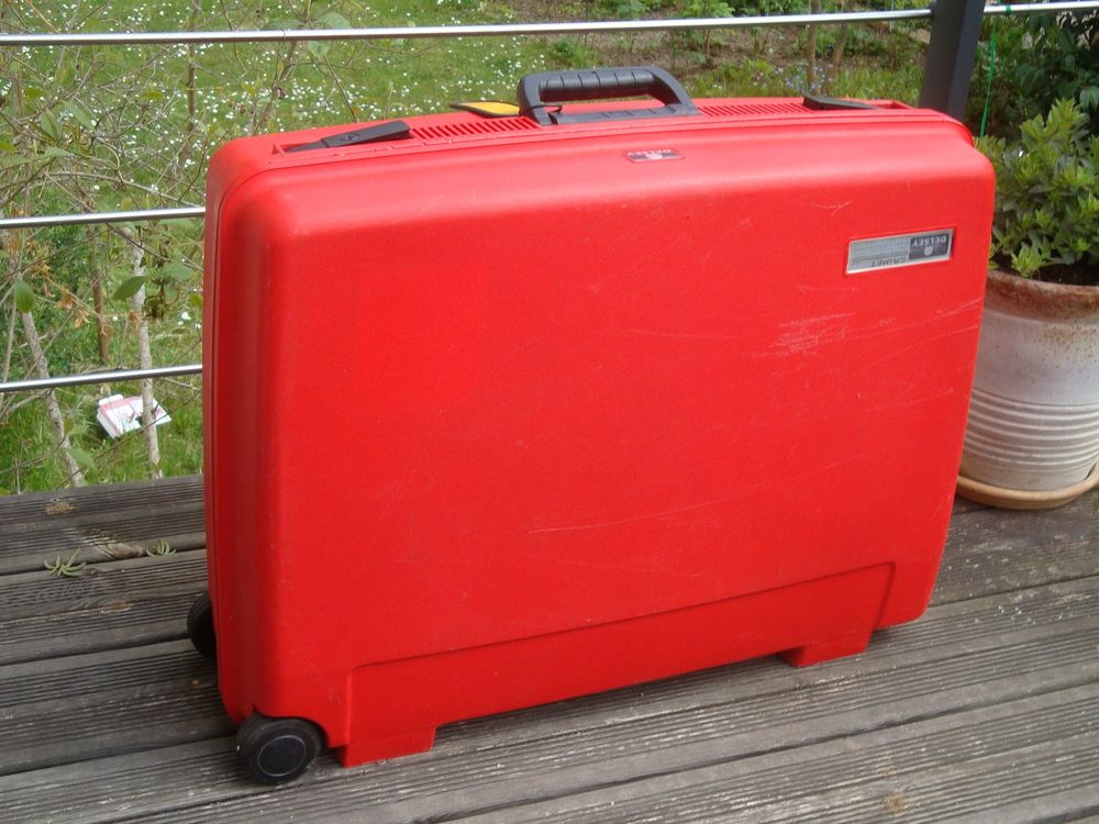 valise rigide &agrave; roulettes DELSEY rouge Maroquinerie
