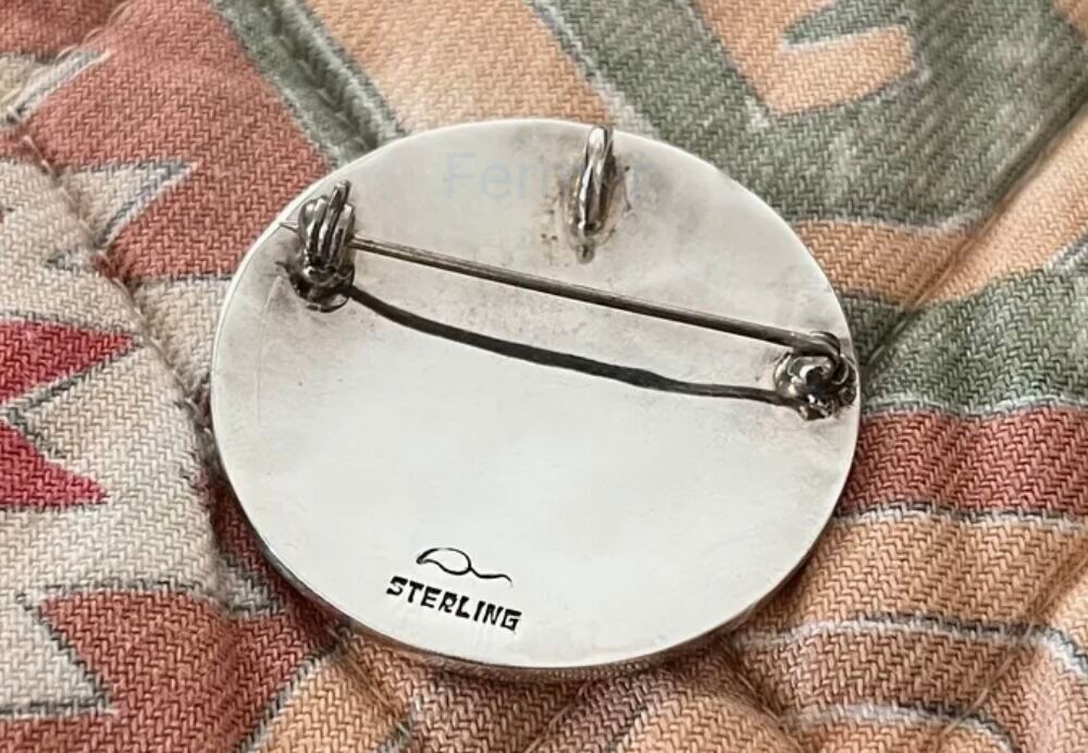 Broche/pendentif en argent Bijoux et montres