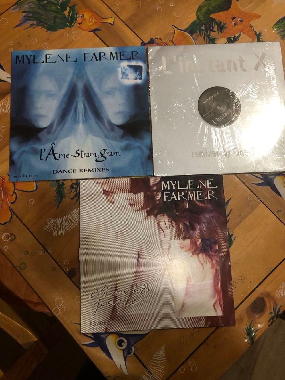 Lot de 2600 disques vinyles maxi 45 d'occasion . CD et vinyles