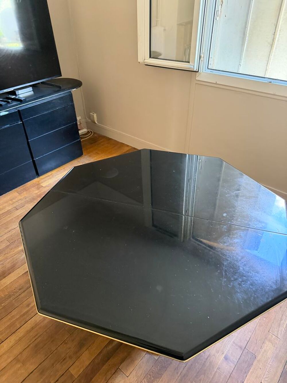 Table octogonale noire avec pied central en marbre Meubles