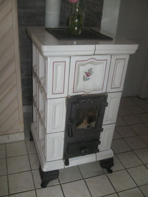 poele a bois en fience oliger caloristar
a venir chercher 400 Granges-sur-Vologne (88)