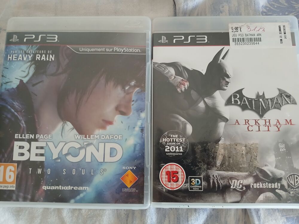 Ps3 avec une manette et 2 jeux Consoles et jeux vidéos