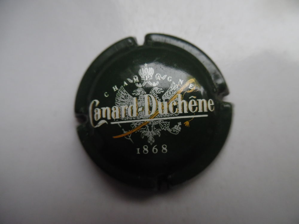 Champagne CANARD-DUCH&Ecirc;NE "Petit sabre, grand 1868". 