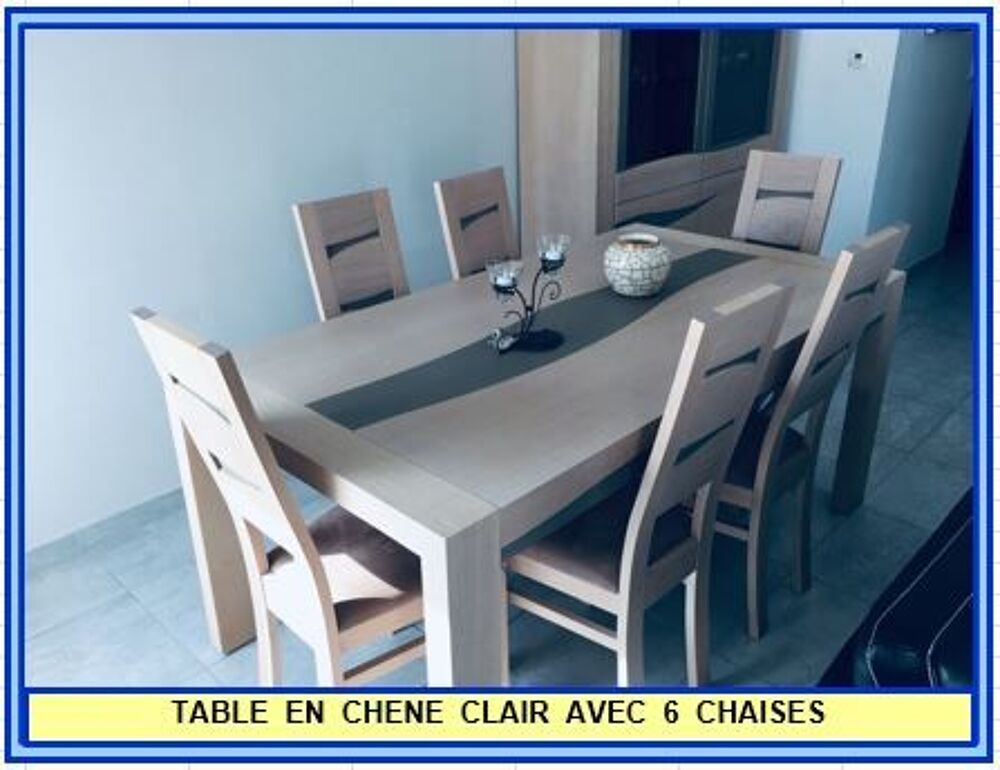 TABLE EN CHENE CLAIR AVEC 2 ALLONGES PAPILLON. Meubles