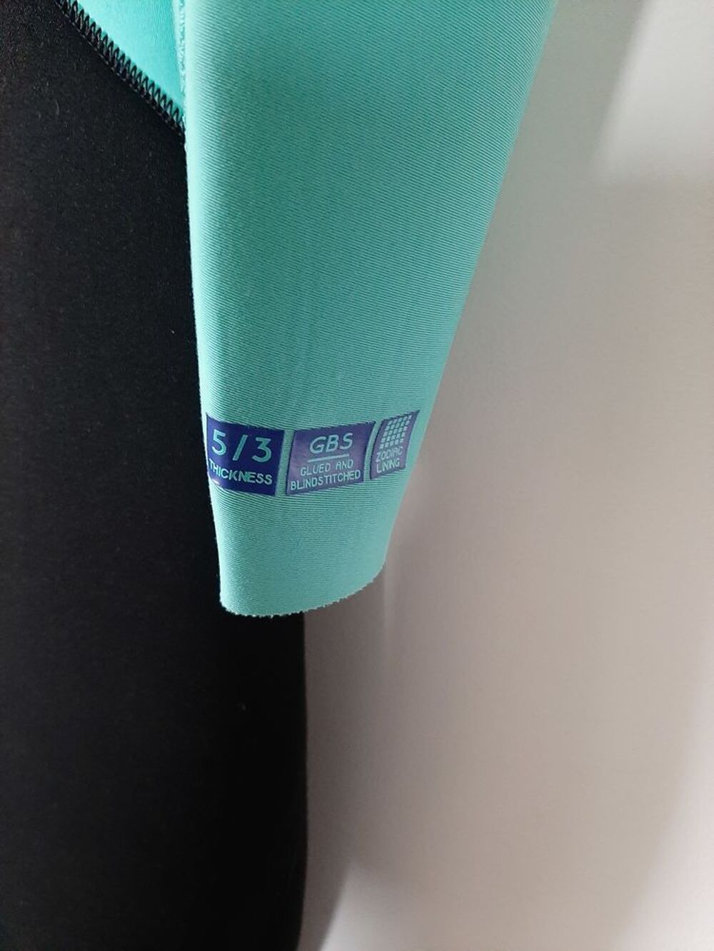 Combinaison int&eacute;grale n&eacute;opr&egrave;ne noir turquoise Sports