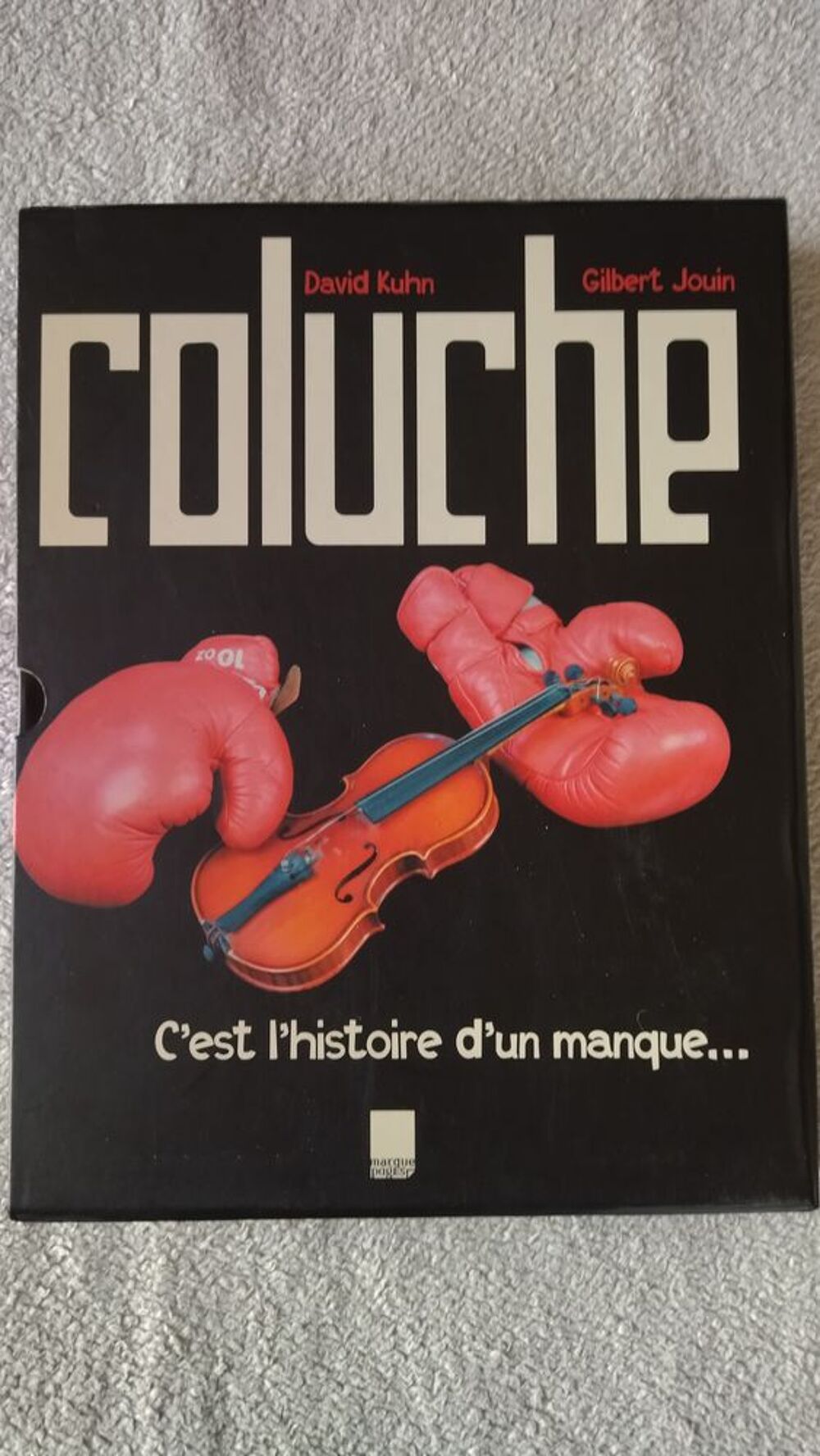Coluche . Livres et BD