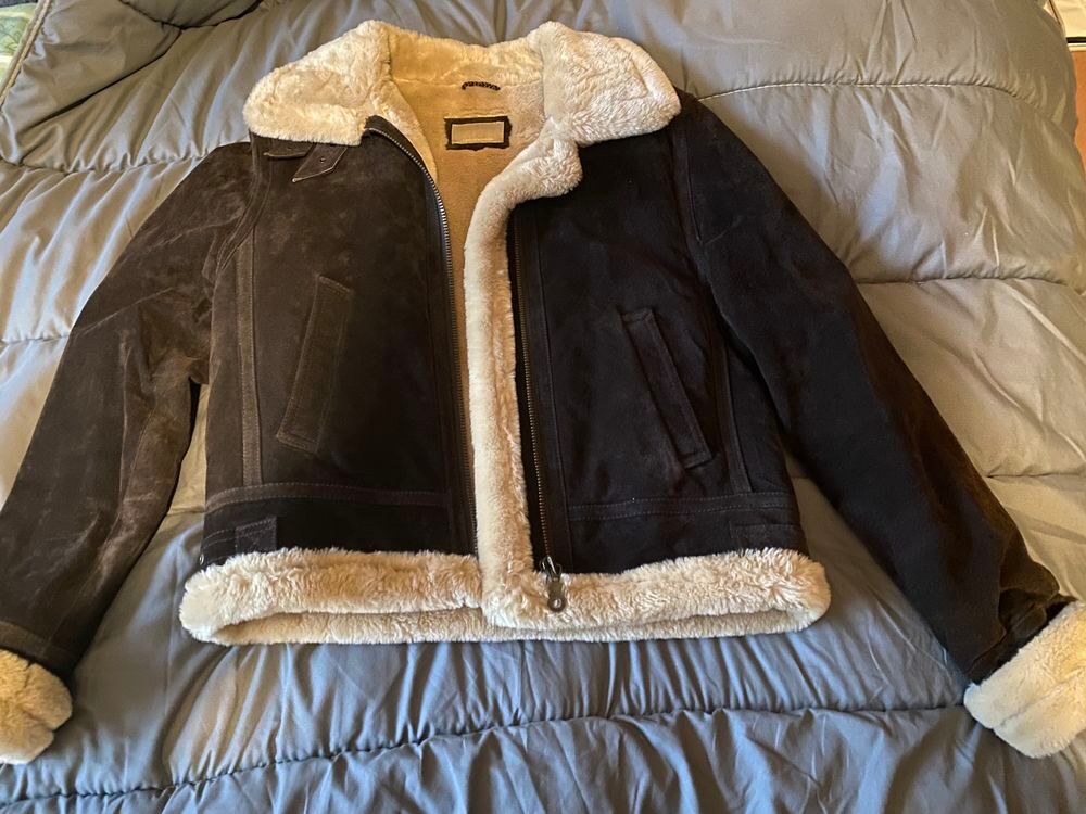 Blouson hiver en daim neuf Vêtements