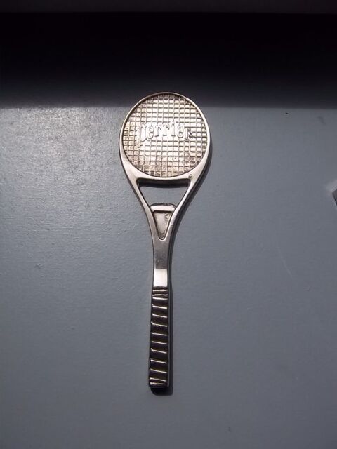 D�capsuleur raquette de tennis Perrier 5 Colombier-Fontaine (25)