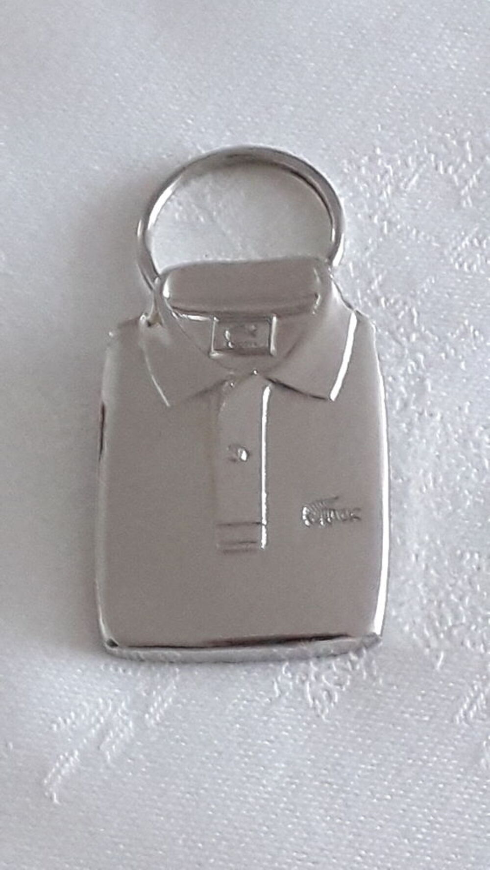 Porte-cl&eacute;s polo LACOSTE
Bijoux et montres