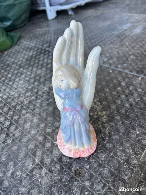 statuette originale repr�sentant une main avec un enfant 1 Torigny-les-Villes (50)