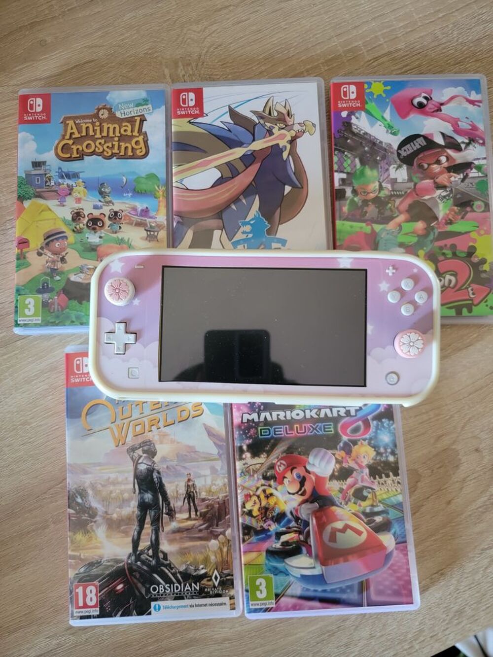 Pack Switch + 5 jeux + coque Consoles et jeux vidéos