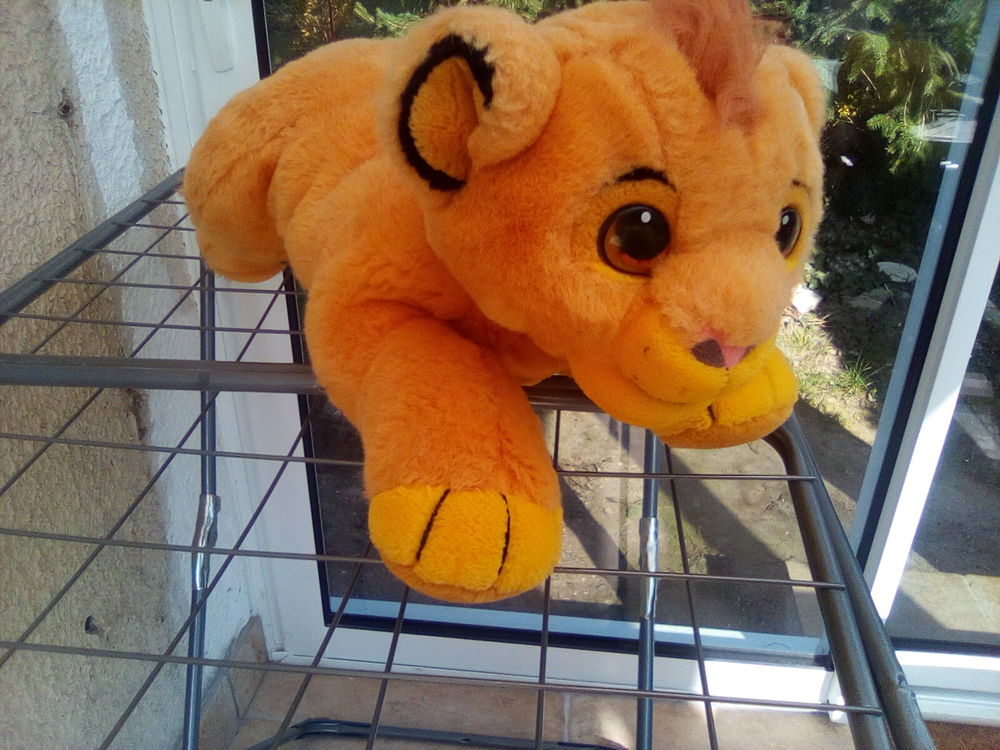 peluche roi lion range pyjama tr&egrave;s bon &eacute;tat Jeux / jouets