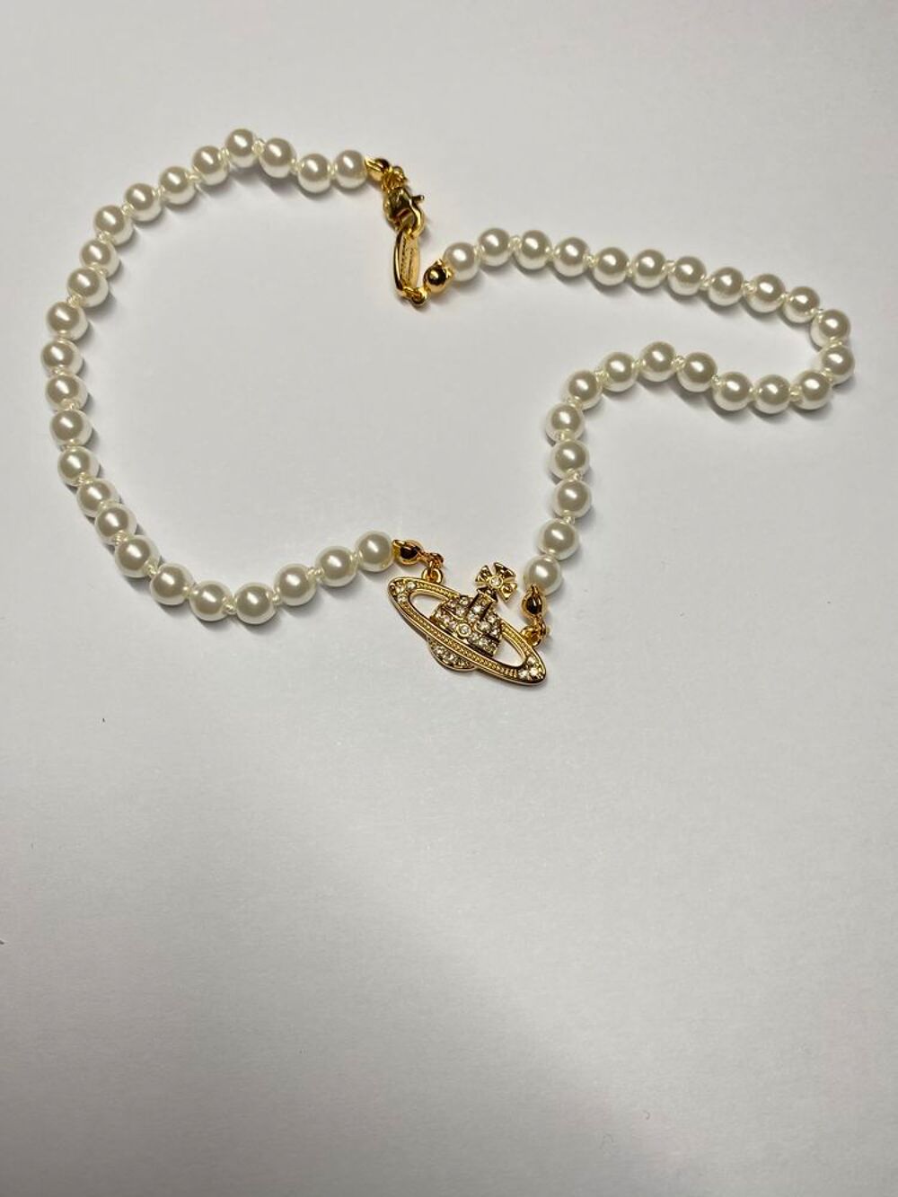 Collier dor&eacute;e &agrave; perle Vivienne Westwood Bijoux et montres