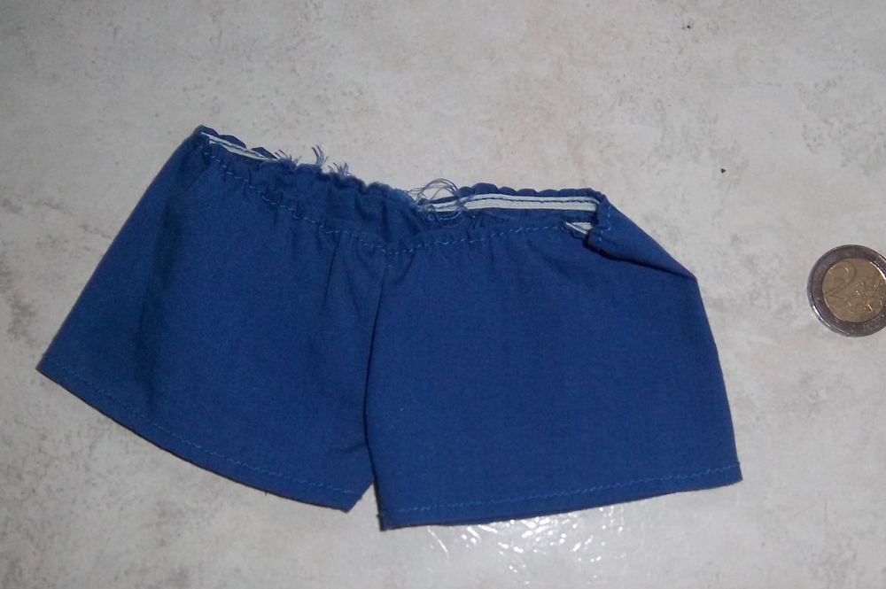 Short bleu poup&eacute;e Jeux / jouets