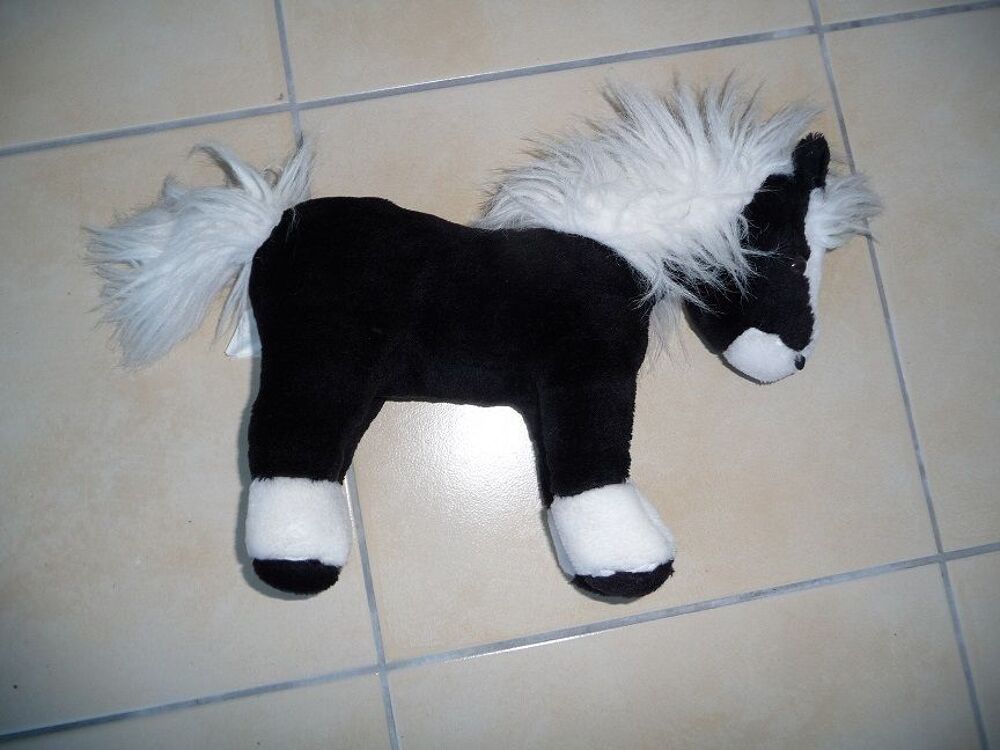 Cheval en peluche noir et blanc Jeux / jouets