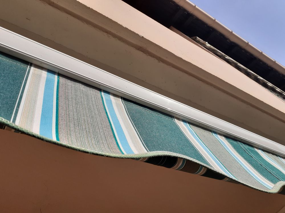 store banne loggia ou terrasse Jardin