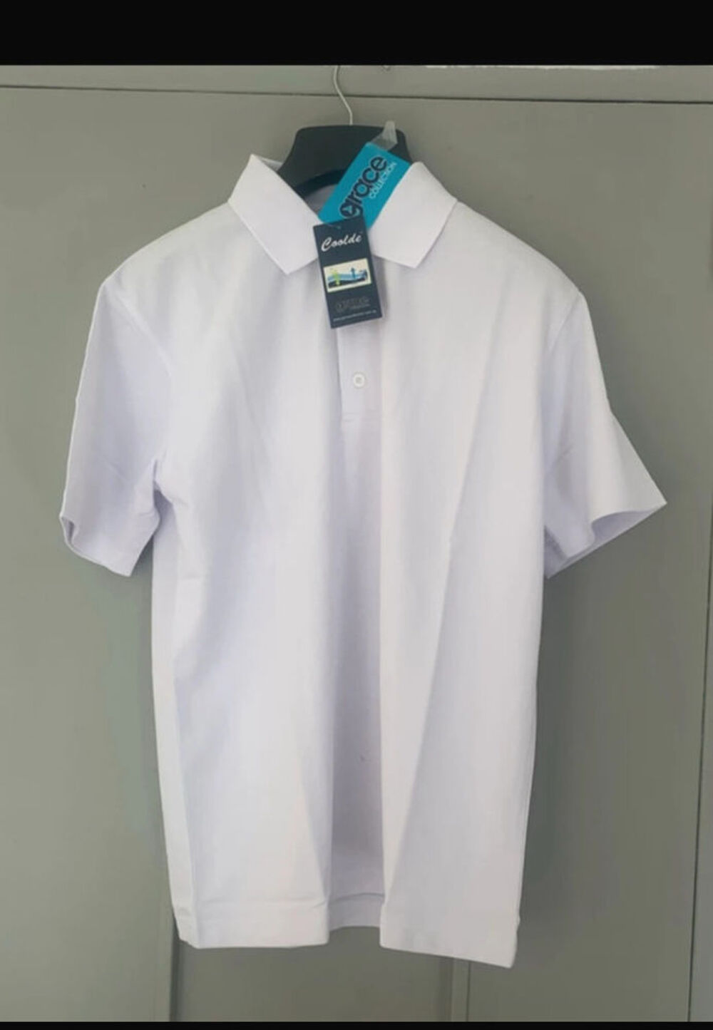 Polo blanc Marque Grace
Collection - Taille S Vêtements