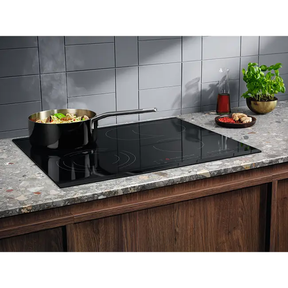 Plaque de cuisson vitroc&eacute;ramique ELECTROLUX EHF6547FOK - 4 z Electroménager