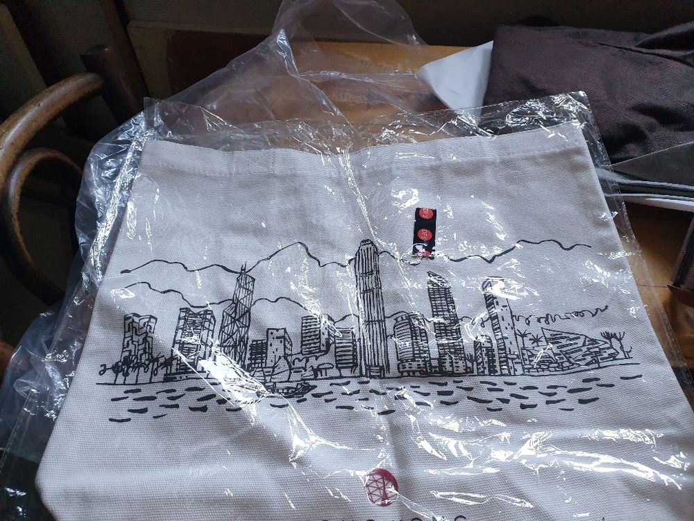 Sac de courses blanc provenant de Hong Kong Maroquinerie