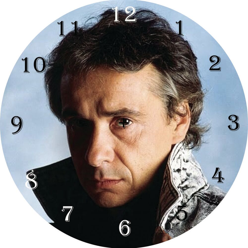 HORLOGE MICHEL SARDOU DIAMETRE 20 CM 
VERRE ET PLASTIQUE 1 Bijoux et montres