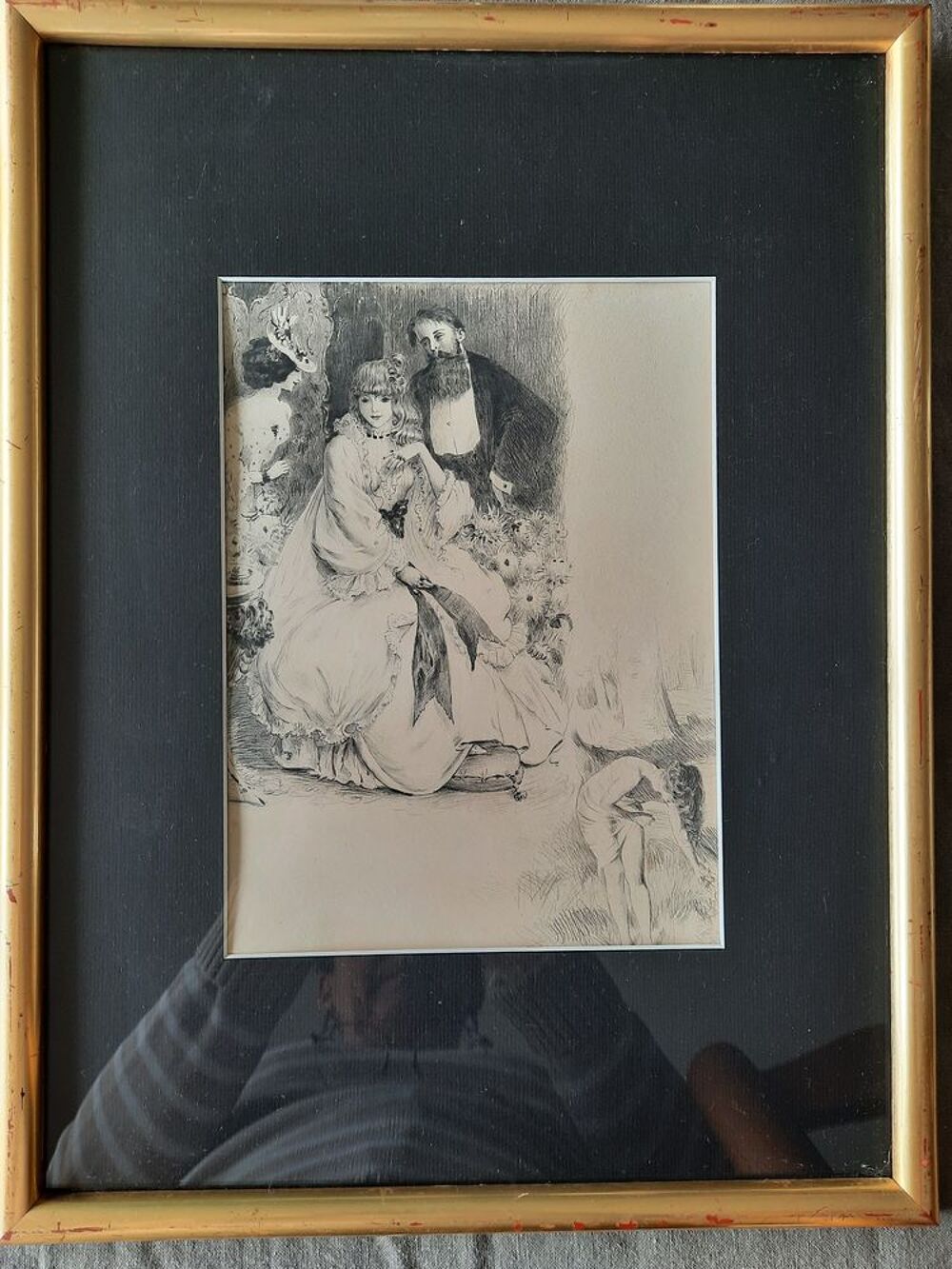 Dessin d'artiste sous verre avec un cadre dor&eacute;.
Décoration