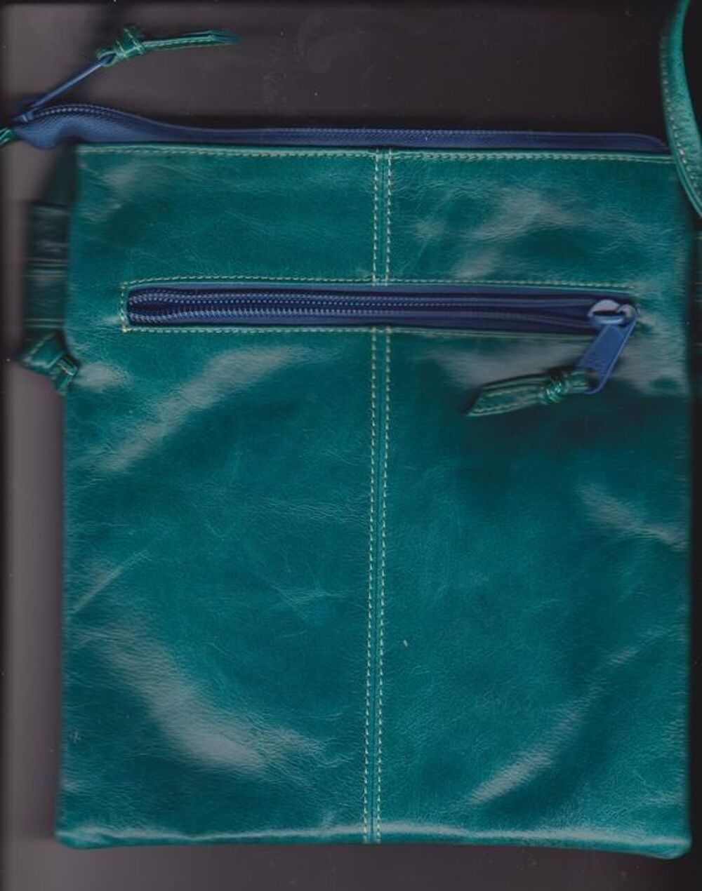 sac &agrave; main / pochette en cuir artisanal Maroquinerie