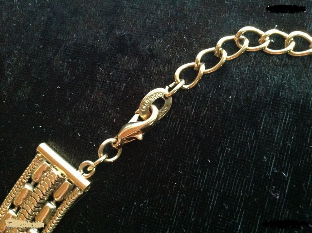 PARURE COLLIER BRACELET PLAQU&Eacute; OR GIL D'AGENA
Bijoux et montres