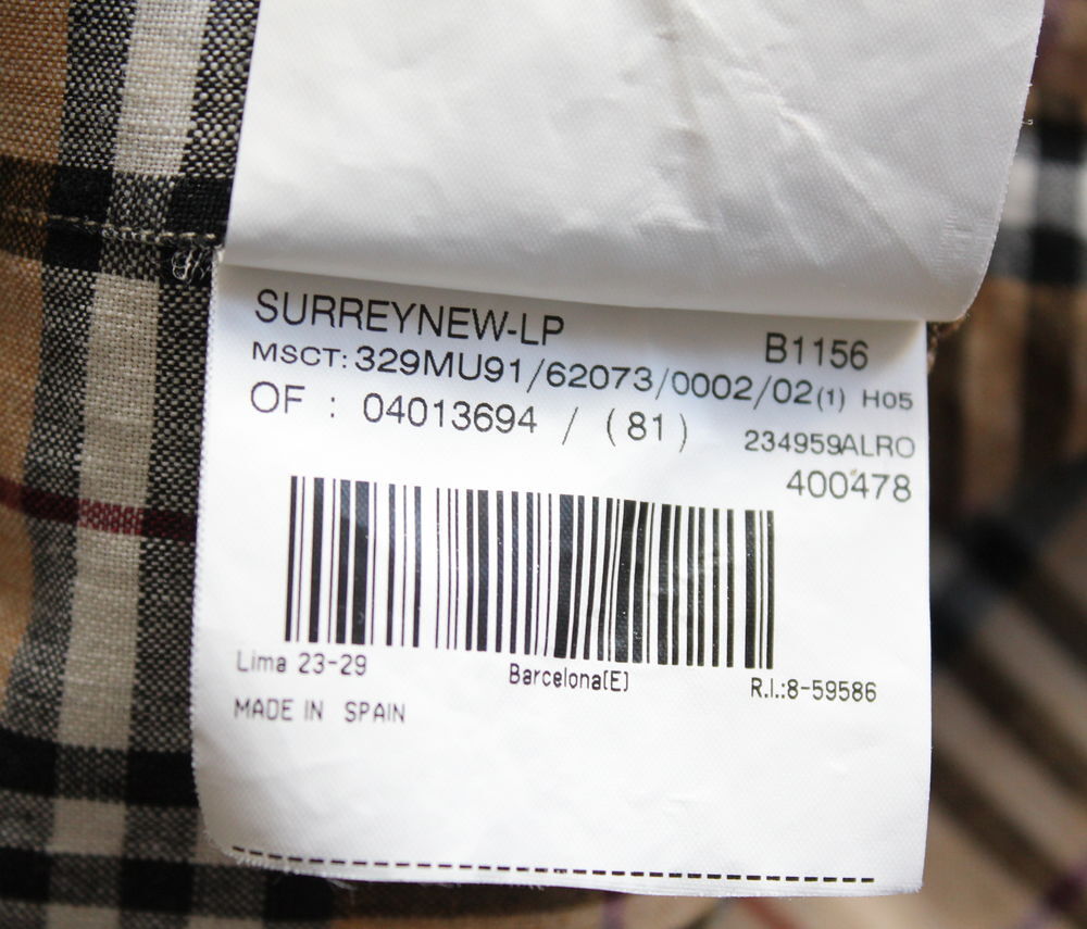 Chemise tartan BURBERRY T.2.
Vêtements
