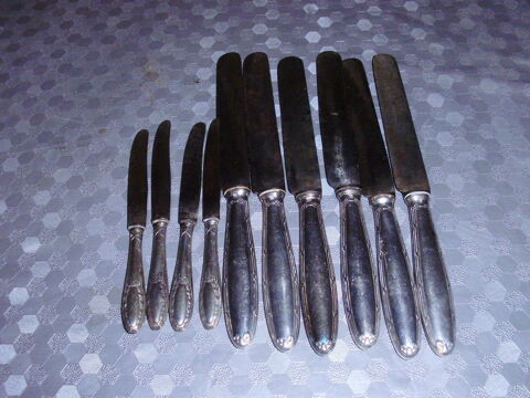 Couteaux argent poin�onn�e. 99 Paris 20 (75)