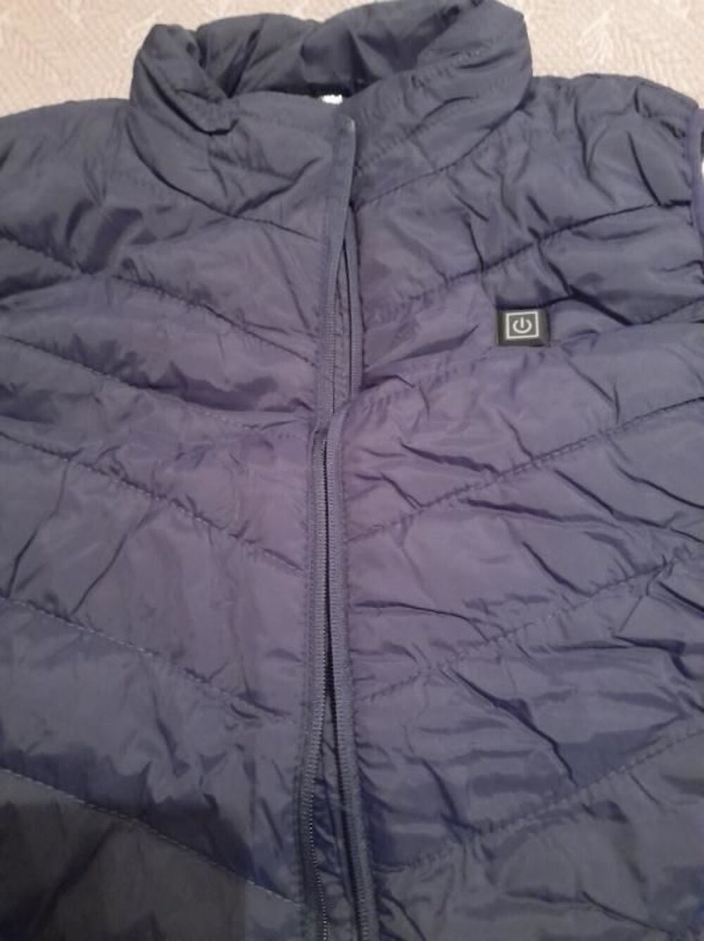 Gilet chauffant Vêtements