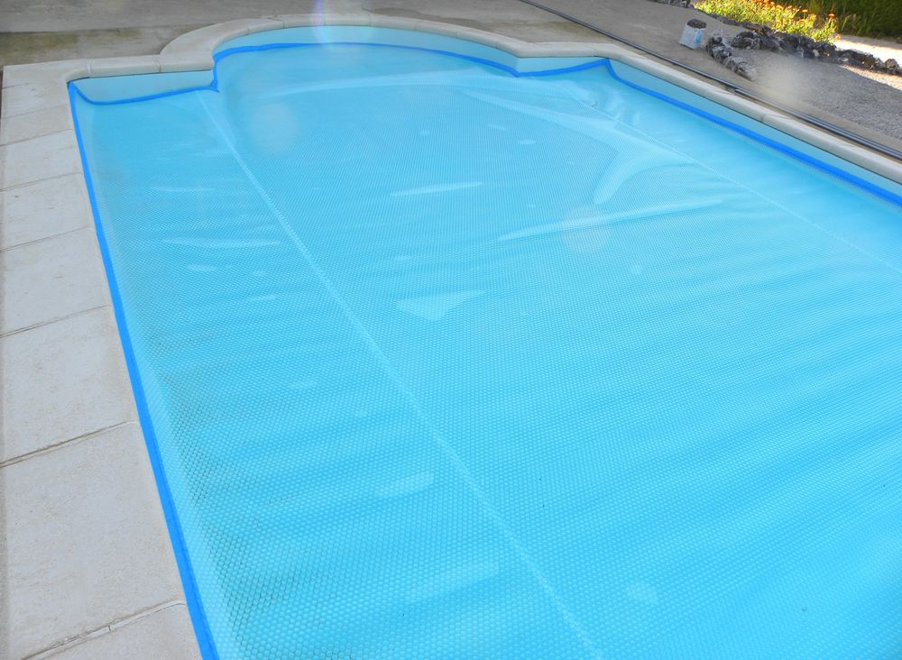 B&acirc;che &agrave; bulles de piscine + enrouleur Jardin