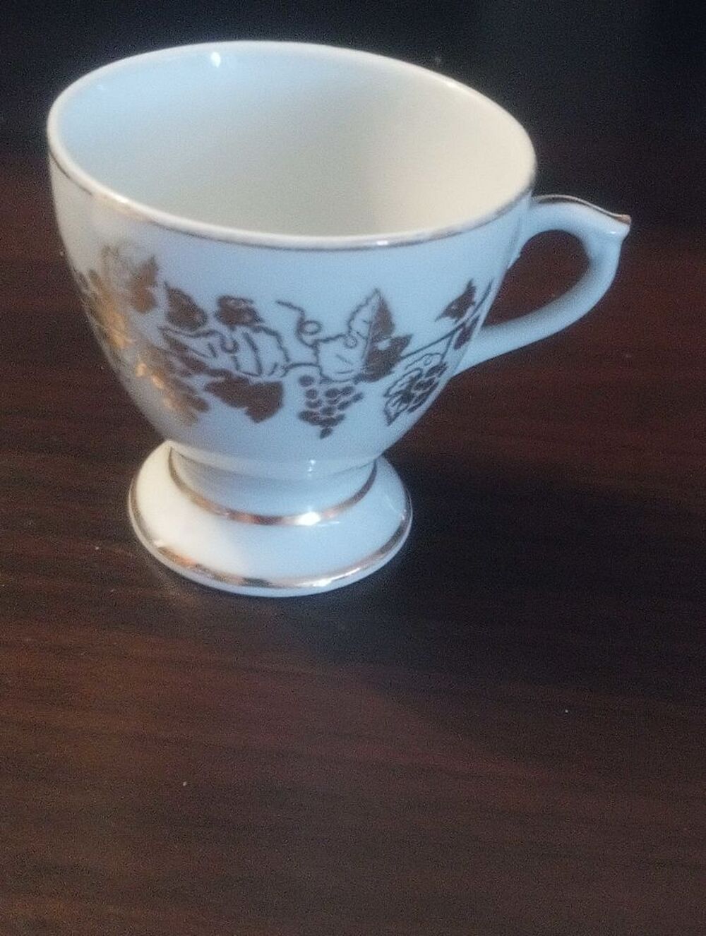 petite tasse avec une dorure Décoration