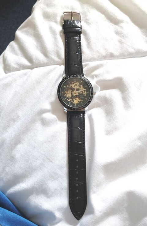 Montre automatique skeleton Gucamel €  mécanique visible €  excellent état 80 Sartrouville (78)