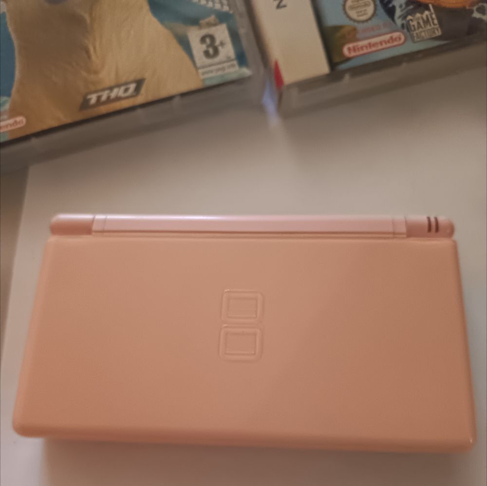 DS Lite Rose TBE avec chargeur Consoles et jeux vidéos
