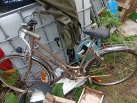   Reparateur de Velo ancien  
