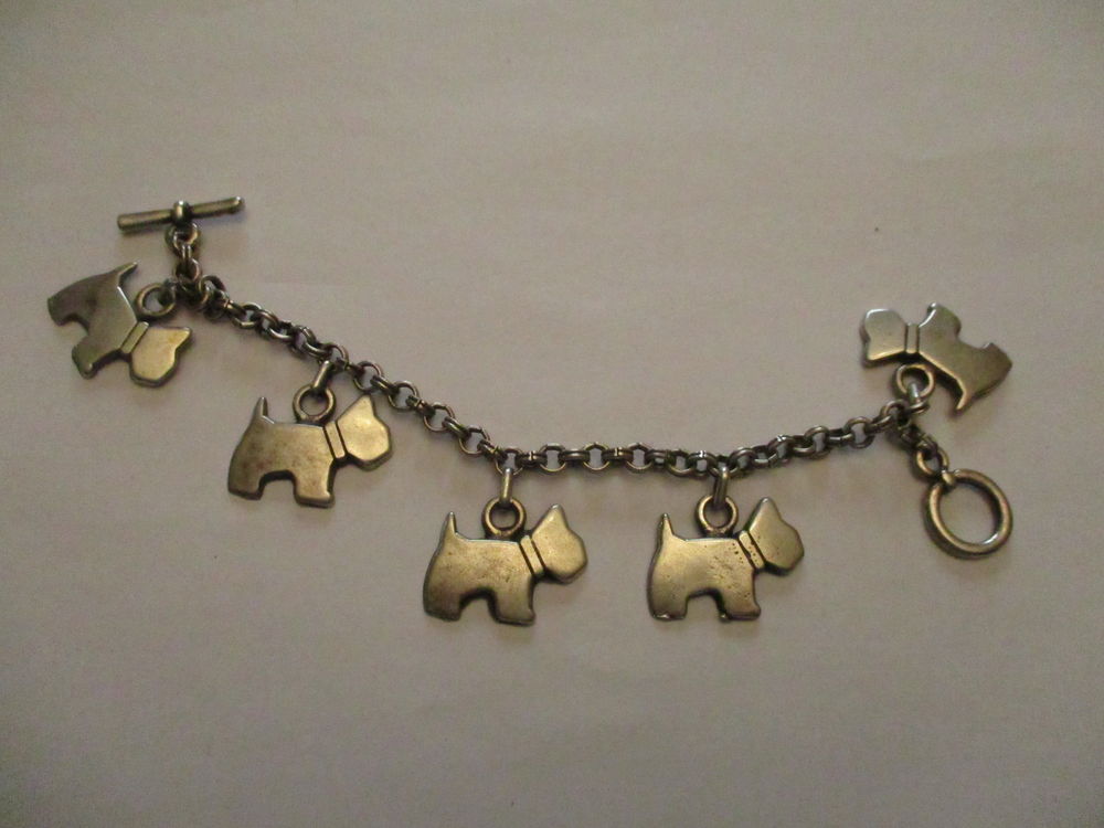 bracelet avec motifs des petits chien longueur totale 18 cm Bijoux et montres