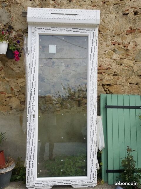 Porte fen�tre pvc double vitrage et volet roulant
560 Beauteville (31)