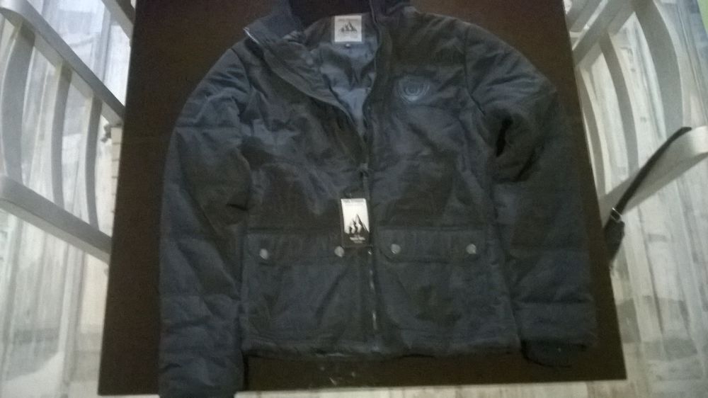 Doudoune Noire Homme
Adventure
Paul Stragas.
NEUVE
Vêtements