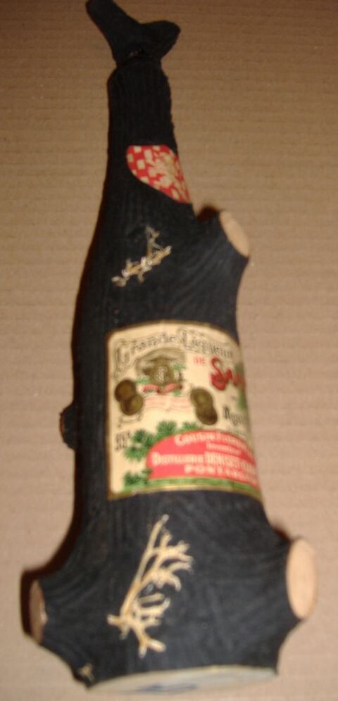 Bouteille vide imitation  Tronc d'arbre  13 Clermont-Ferrand (63)