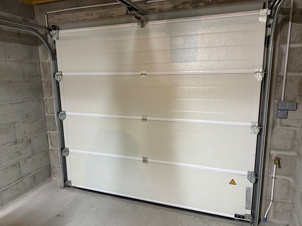 Portail sectionnel + moteur Novoferm Bricolage