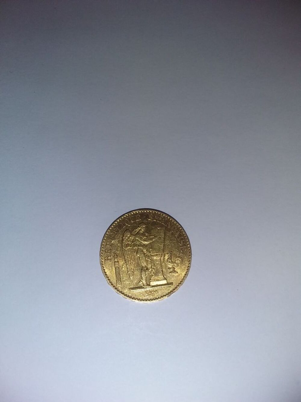 Piece de 20 francs or Genie 1875. Bijoux et montres