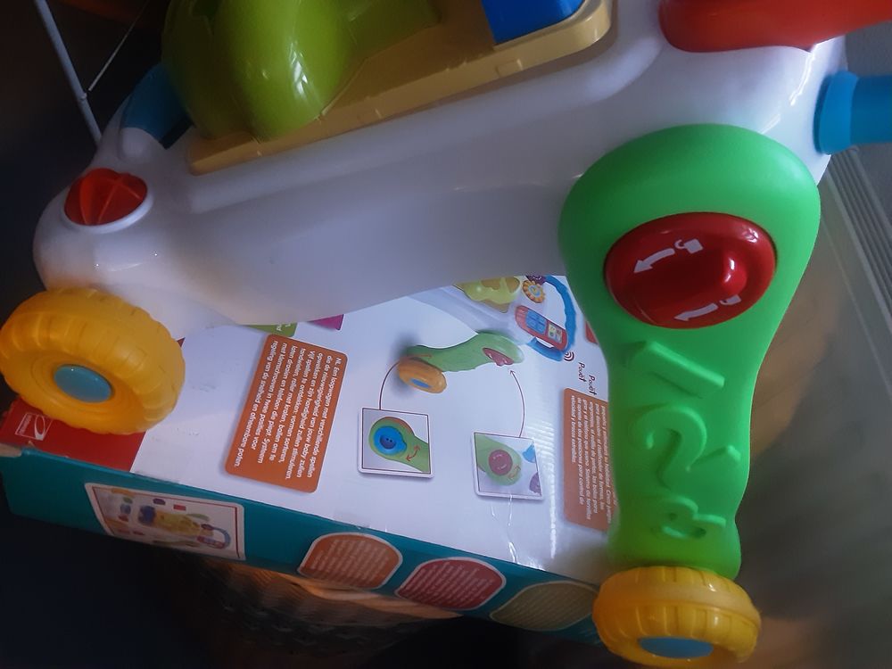 POUSSEUR MULTI-ACTIVIT&Eacute;S BLOOMY NEUF **DU MAGASIN LA GRANDE Jeux / jouets